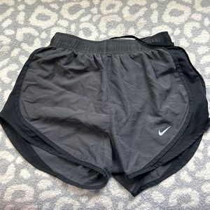 grey Nike running shorts